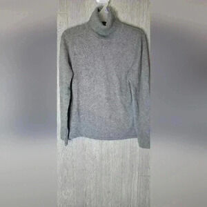 Brand unknown gray turtle neck long sleeve 100 % Cashmere sweater.